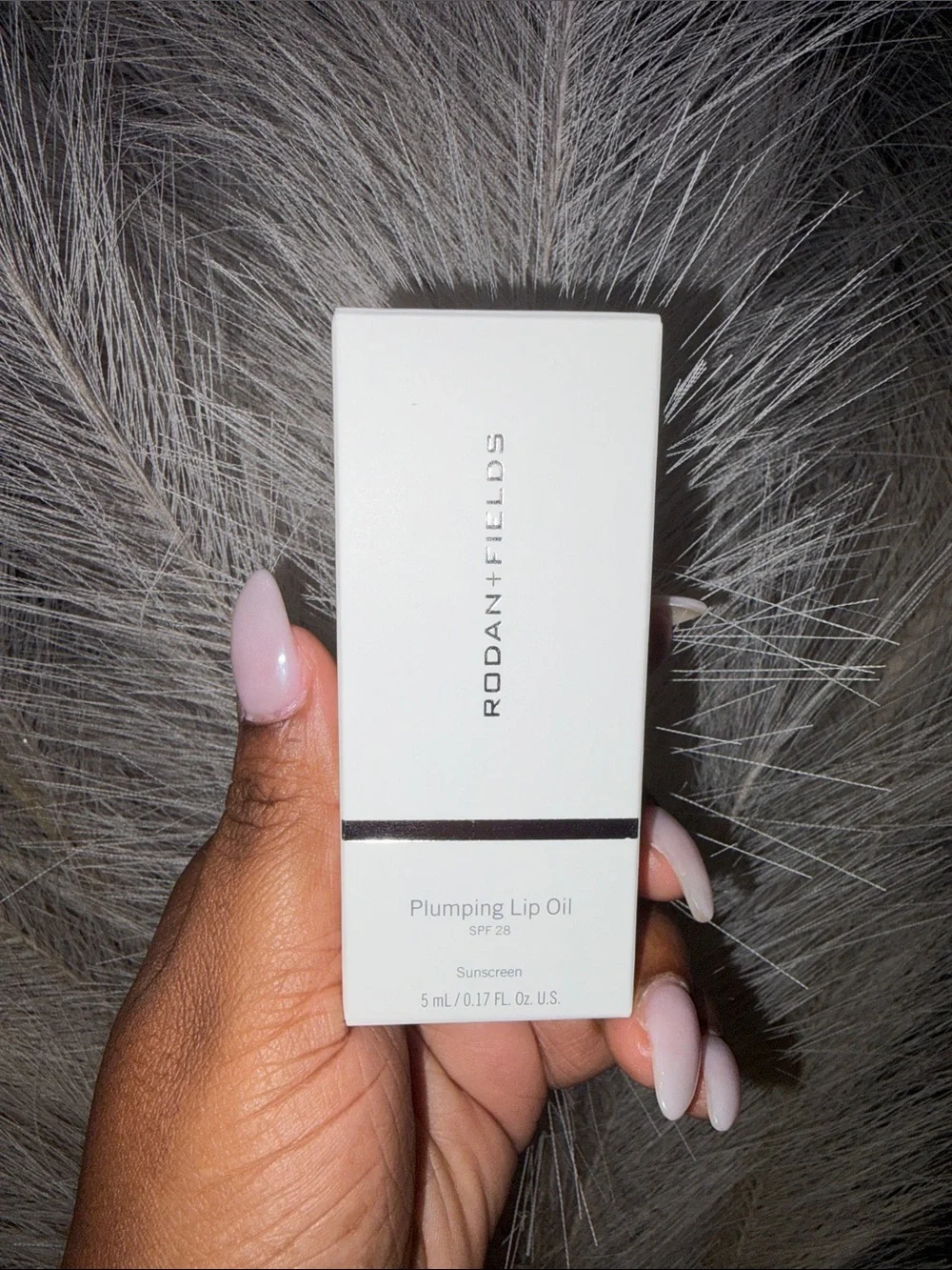 Rodan + Fields Plumping Lip Oil in White Packaging